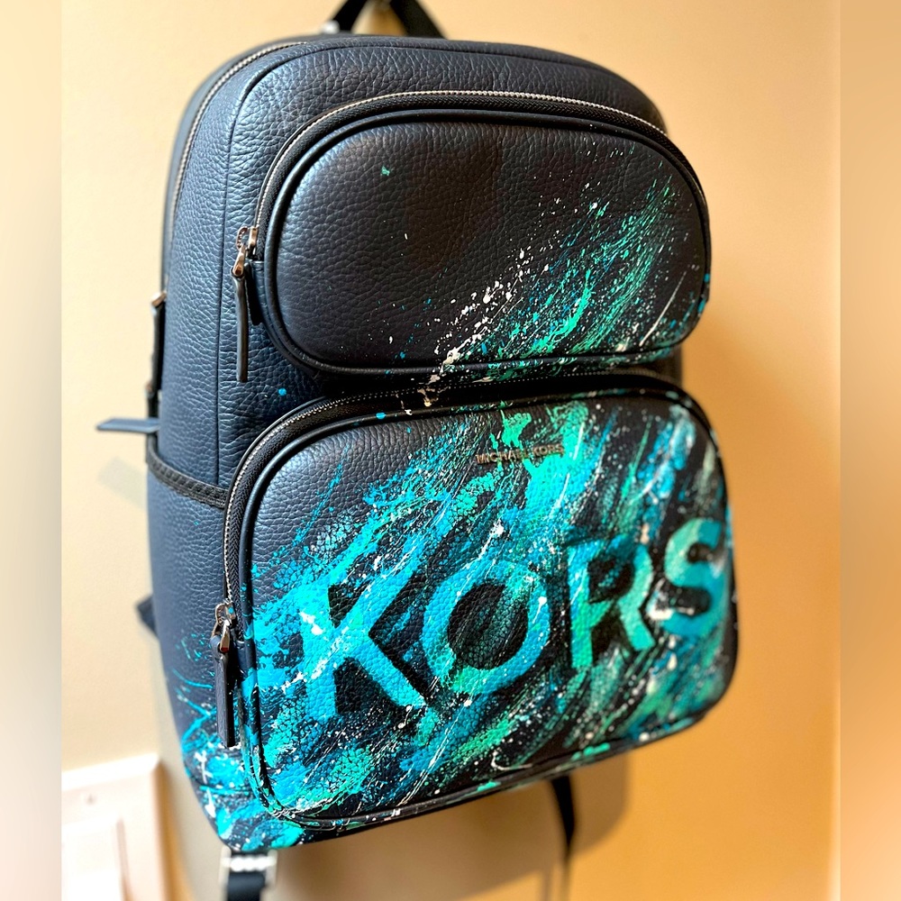 Michael Kors numbered “fire and ice” Collection blue utility backpack